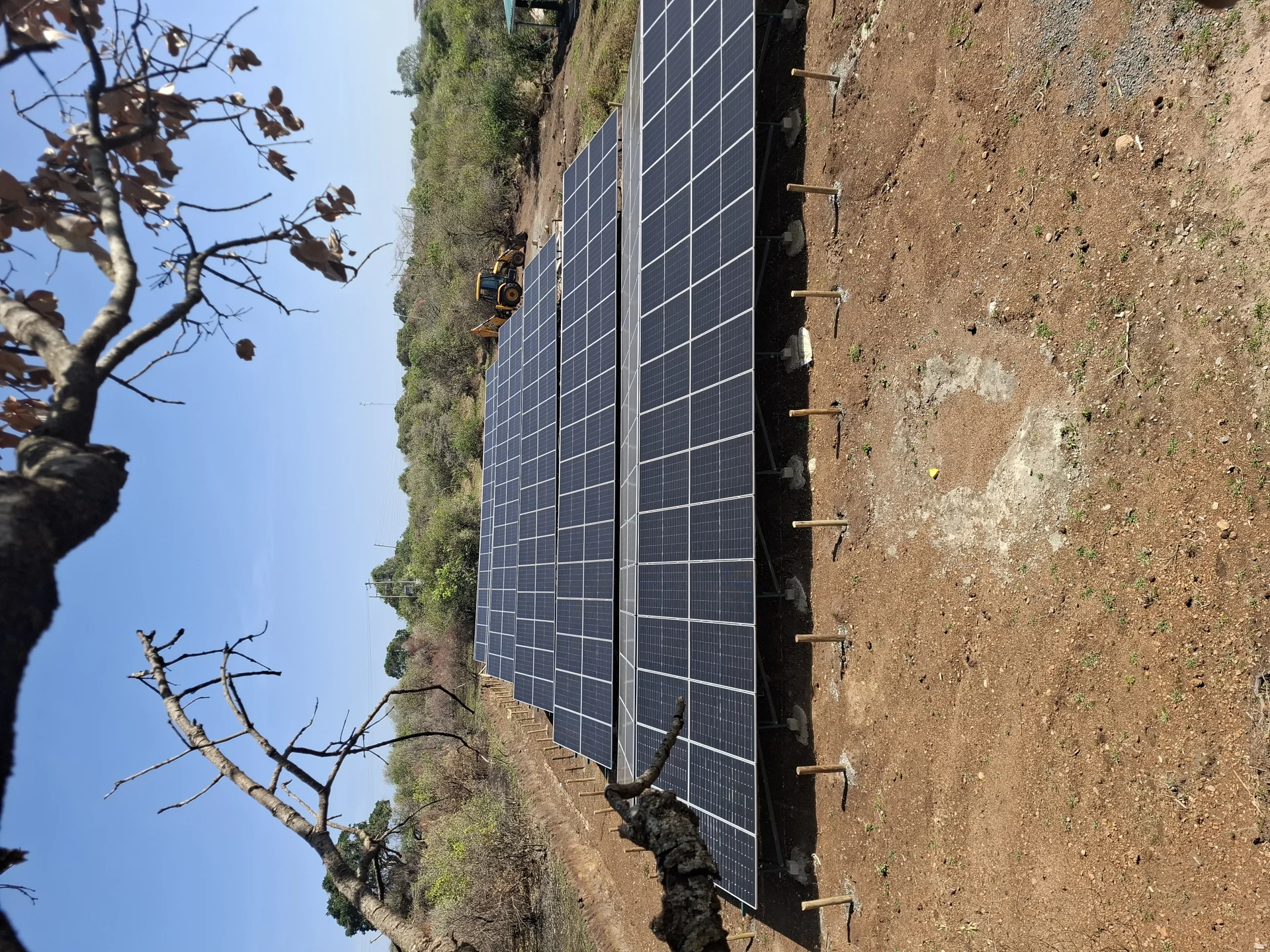 Solar water heating system mounted on a roof